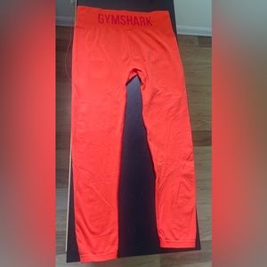 ORANGE GYMSHARK LEGGINGS. SIZE M.